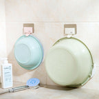 Pink and beige seamless wall-mounted washbasin hook rack by Cavira, punch-free ABS bathroom basin hanger with sleek design.