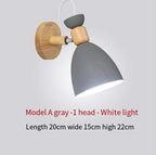 Nordic wooden iron bedside wall lamp by Cavira, minimalist wall light for bedroom, corridor, or restaurant decor.