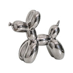 Colorful ceramic balloon dog sculpture by Cavira, modern minimalist décor ornament, 20x18cm for shelf, desk, or coffee table display.