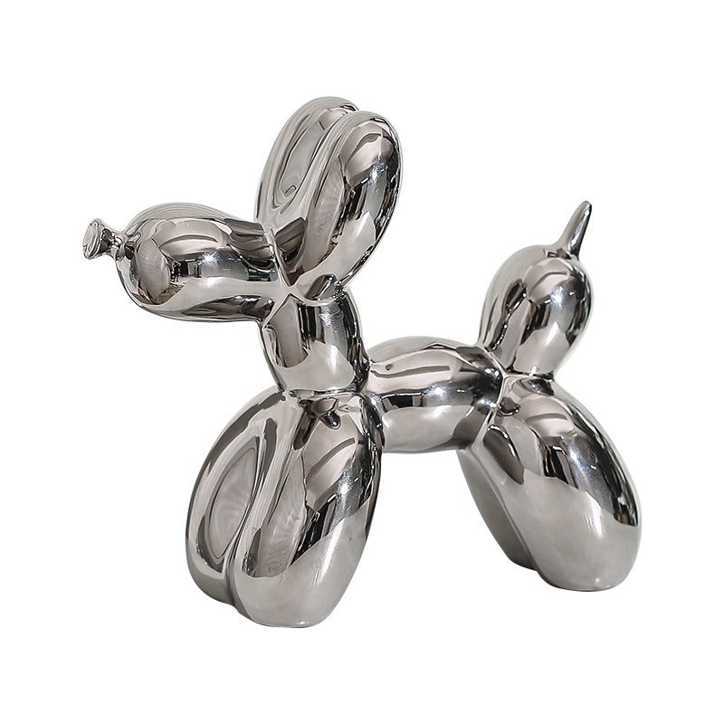 Colorful ceramic balloon dog sculpture by Cavira, modern minimalist décor ornament, 20x18cm for shelf, desk, or coffee table display.