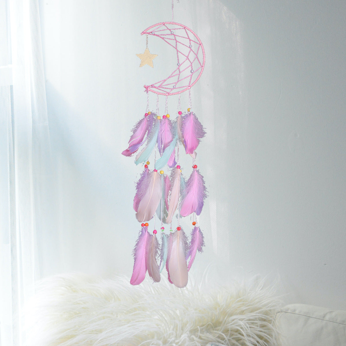Crescent moon and star feather dream catcher wall hanging by Cavira, Nordic boho celestial decor for bedroom, nursery, or living room