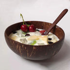 Handmade natural coconut shell bowl by eprolo for serving fruit, salads, or kitchen storage, eco-friendly and rustic in appearance.
