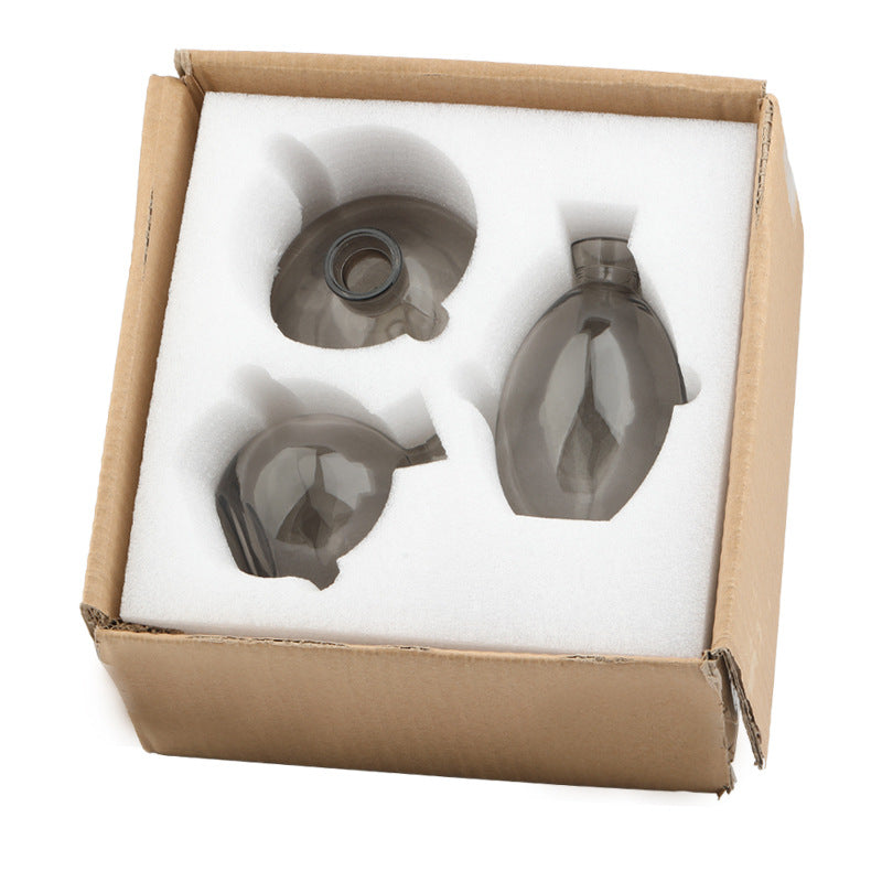 Set of three Cavira colour-dipped glass vases with light spray paint, ideal for home decor and floral arrangements.