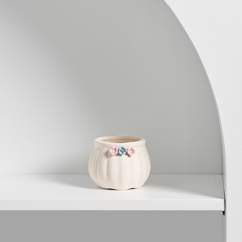 Small ceramic succulent pot by Cavira, decorative mini plant container for cacti, succulents, and air plants on desk or shelf.
