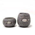 Set of two succulent-shaped resin planters by Cavira, decorative cactus and fleshy plant pots for indoor table and desk decor.