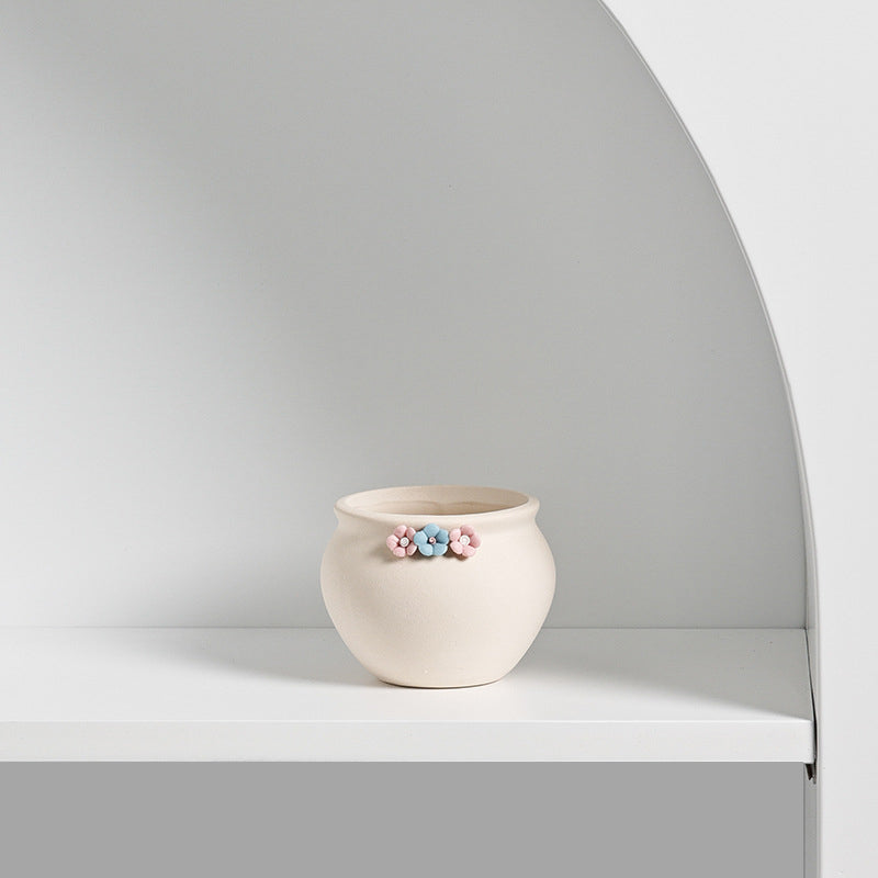 Small ceramic succulent pot by Cavira, decorative mini plant container for cacti, succulents, and air plants on desks or shelves.