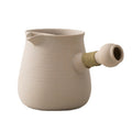 White ceramic Bai Ni teapot by Cavira, 600ml traditional clay boiling pot for loose-leaf tea, stovetop and flame safe.