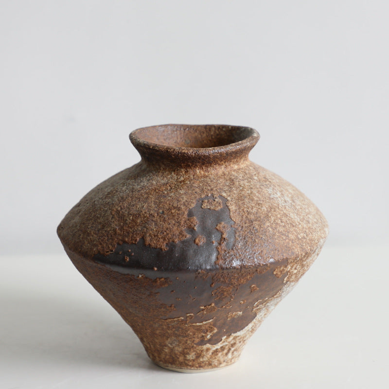 Rustic handmade ceramic vase by Cavira featuring mottled glaze, perfect for floral arrangements and Zen-inspired home decor.
