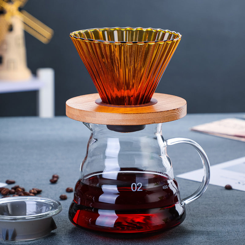 Colorful glass pour-over coffee dripper and wooden tray set by Cavira, featuring a minimalist Japanese design for brewing coffee.