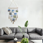 Handwoven cotton wall tapestry with photo clips, featuring geometric boho design, wooden ring, and mini clips for bedroom or living room.