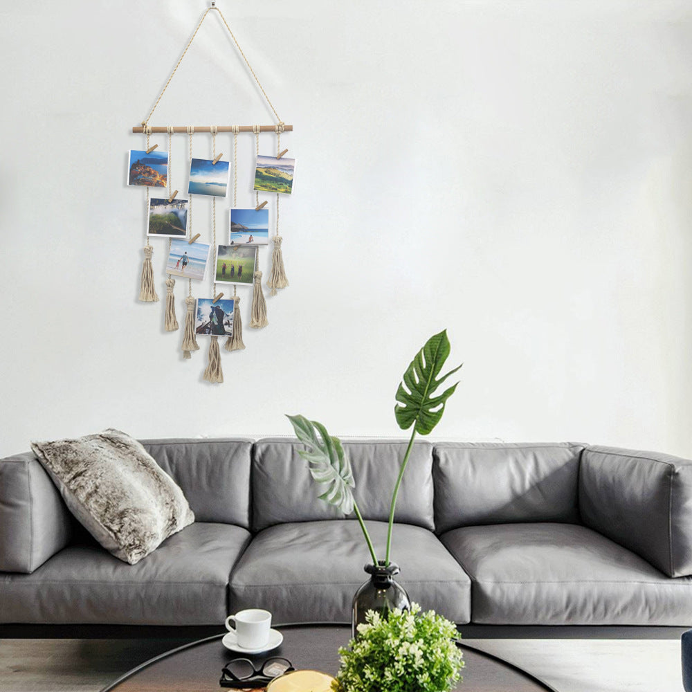 Handwoven cotton wall tapestry with photo clips, featuring geometric boho design, wooden ring, and mini clips for bedroom or living room.