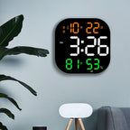 Cavira LED acrylic smart wall clock with digital display, thermometer, alarm, countdown, and night light in a modern living room setting