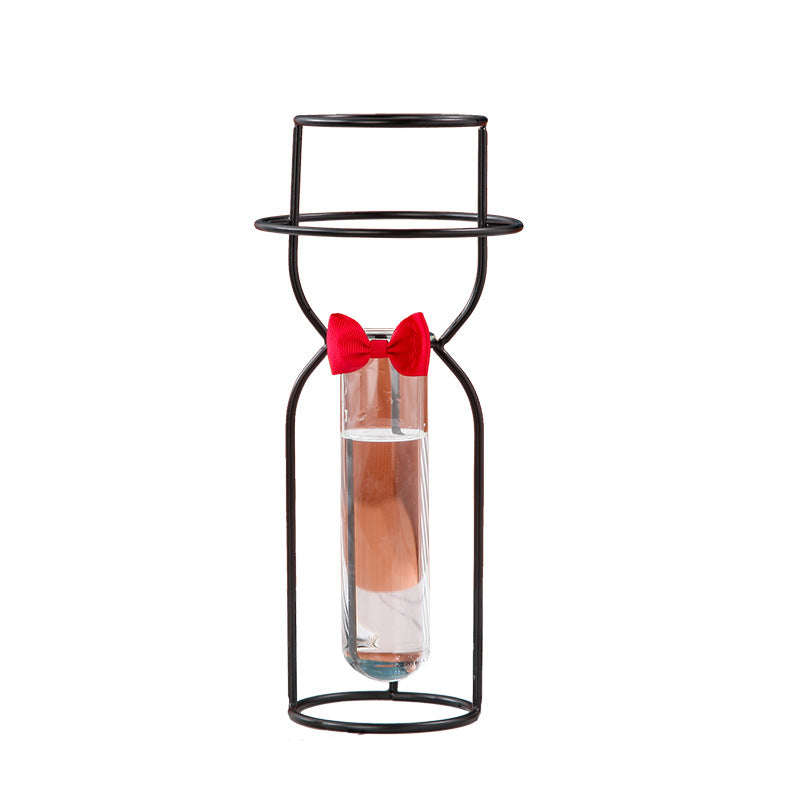 Gold and rose gold decorative glass vase from Cavira, ideal for flower arrangement and home decor.