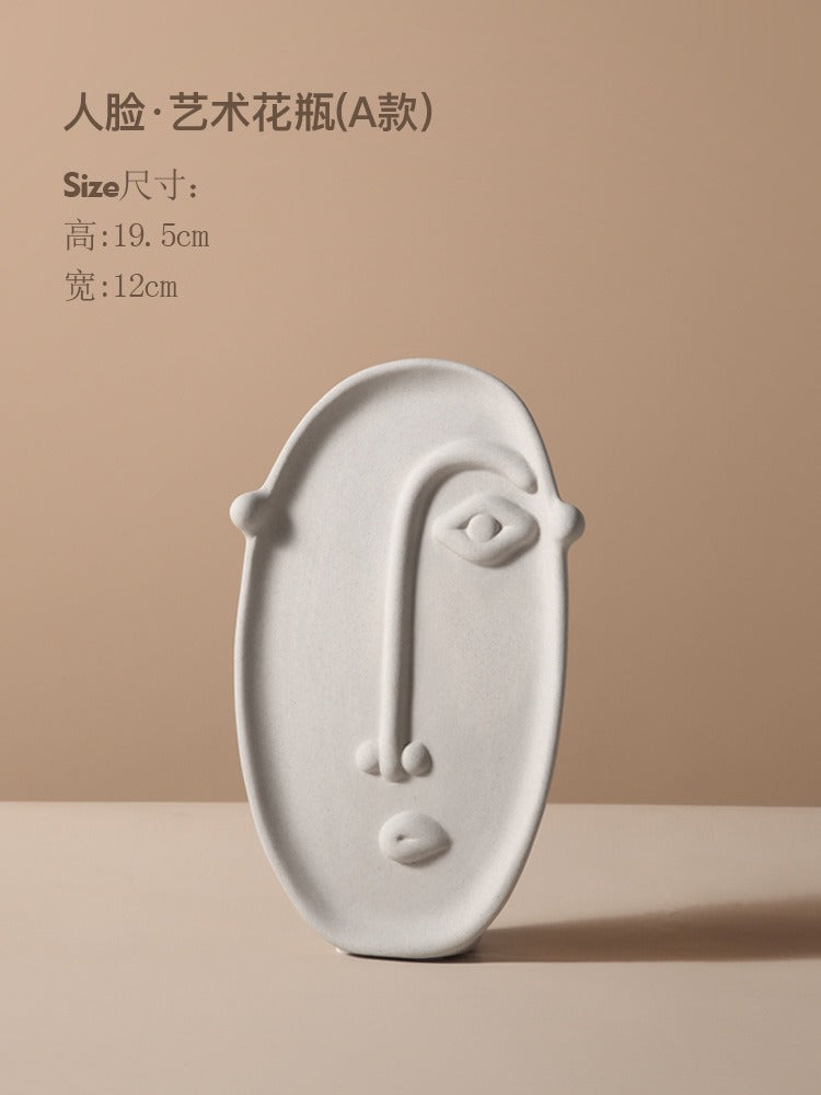 Ceramic vase with geometric abstract face design by Cavira, perfect for home decor, shelf styling, or gifting.