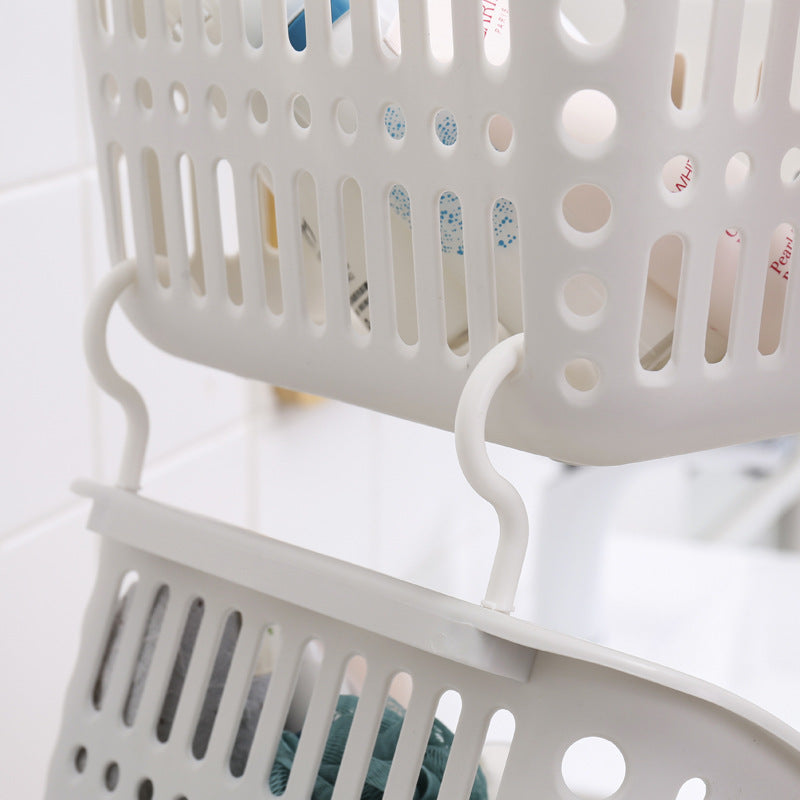 Plastic double hook hanging storage basket by Cavira mounted on wall for kitchen, bathroom, or bedroom organization.