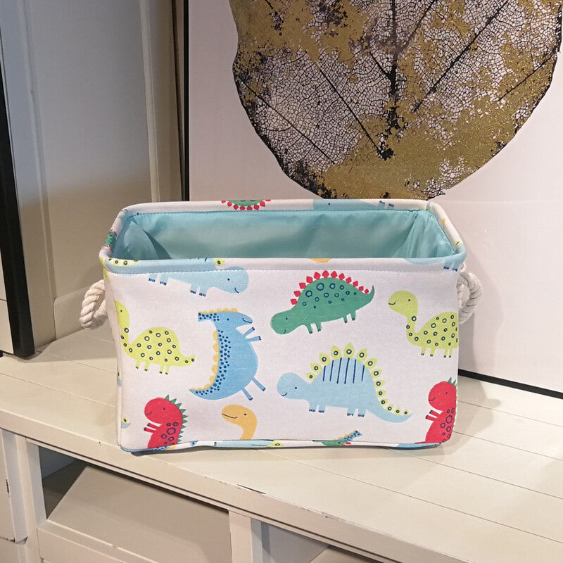 Cavira canvas folding dinosaur storage basket with embroidered cartoon dinosaur, ideal for kids' toys and stationery in bedroom or nursery