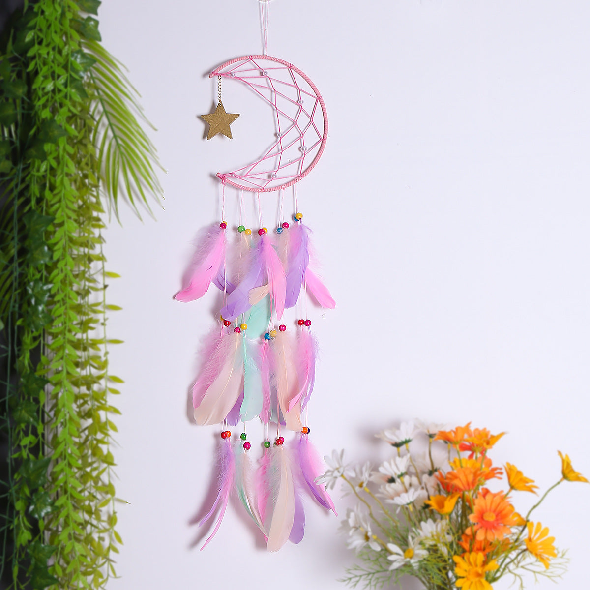 Cavira crescent moon and star feather dream catcher wall hanging with celestial design, perfect for bedroom or nursery decor.