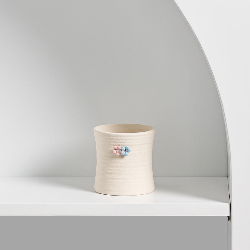 Small ceramic succulent pot by Cavira, decorative mini plant container for succulents, cacti, and air plants on desk or shelf.