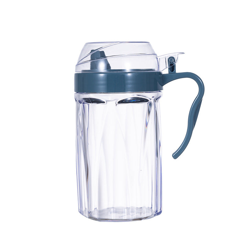 Cavira Precision Pour oil and condiment dispenser bottle with eagle-beak spout, transparent plastic, for oil, sauce, and vinegar.