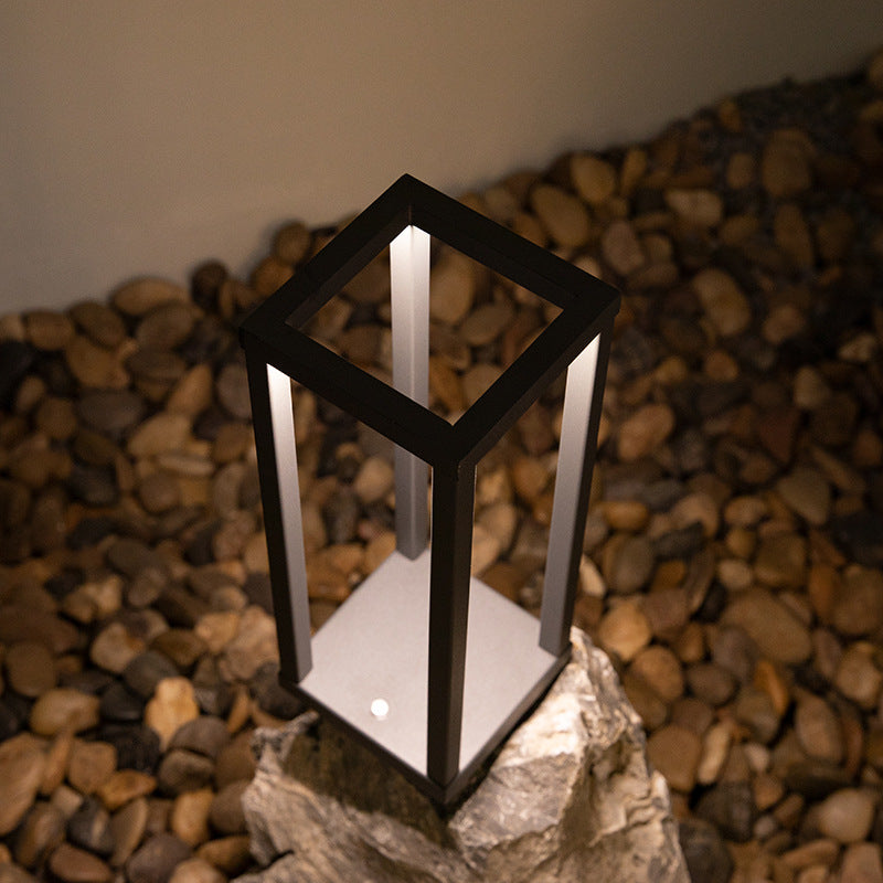 Rechargeable LED table lamp by Cavira featuring aluminium alloy design, tricolour dimming, ideal for bedside, camping, and hotel use.