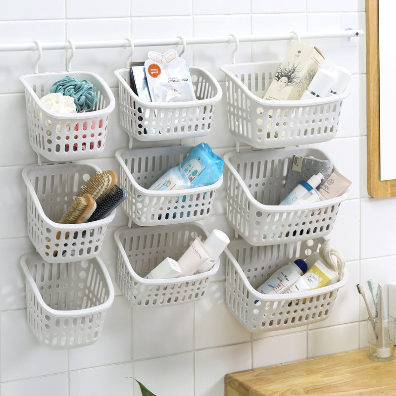 Plastic wall-mounted storage basket with double hooks by Cavira, ideal for kitchen, bathroom, or bedroom organization.