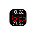 Cavira LED acrylic smart wall clock with digital display, thermometer, alarm, countdown, and night light in a modern living room setting