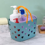 Portable Cavira hollow bath and storage basket made of PP plastic, shown in four colors, ideal for bathroom toiletries and laundry.