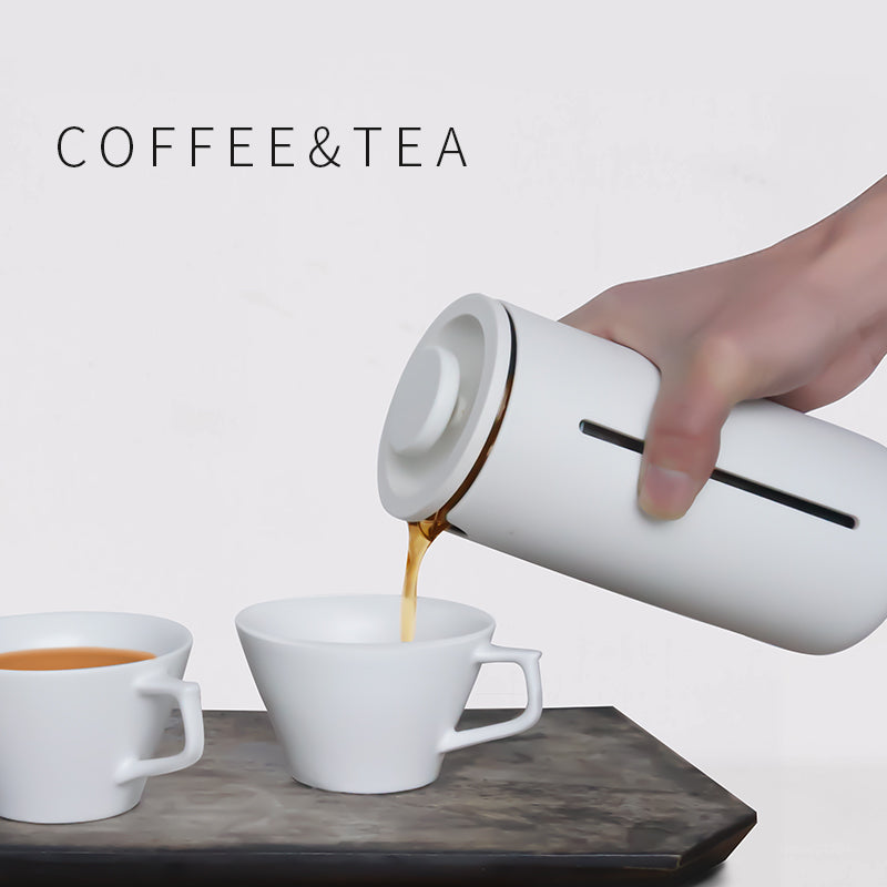 Portable Borosilicate glass French press with white and black frame for coffee and tea brewing at home, office, or travel.