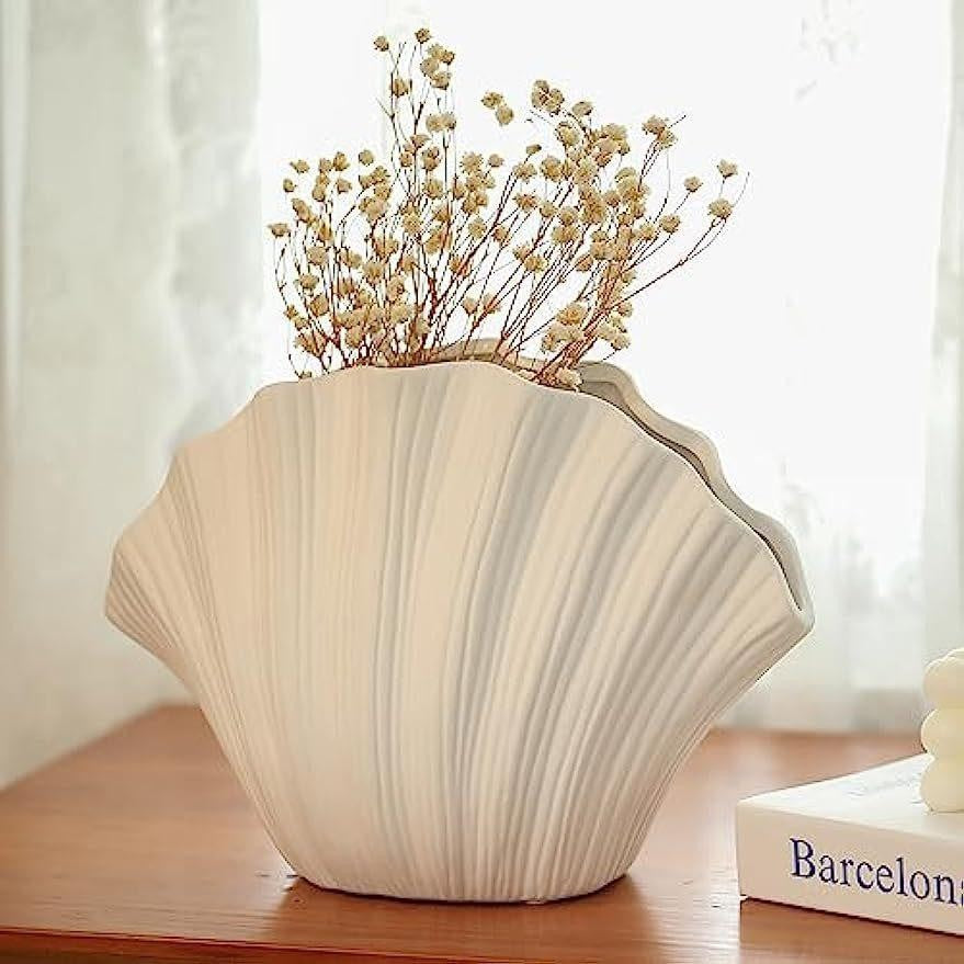 White porcelain ceramic vase by Cavira, modern minimalist design for hydroponic flower arrangements and home decor.