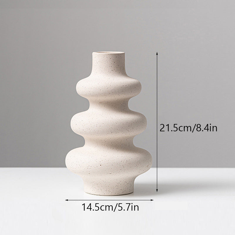 Frosted grain ceramic vase by Cavira with textured matte finish, ideal for flower arrangements and home decor.