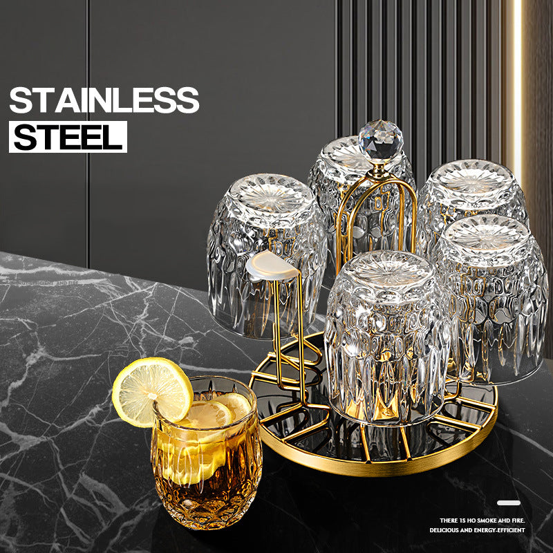 Cavira rotating inverted glass holder and drainer rack with carbon steel construction for hanging wine glasses in kitchen or bar.