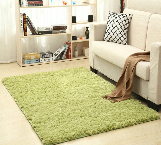 Cavira super soft shag area rug with silky polyester texture, perfect for living rooms, bedrooms, or nurseries.