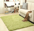 Cavira super soft shag area rug with silky polyester texture, perfect for living rooms, bedrooms, or nurseries.
