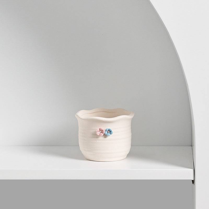 Small ceramic succulent pot by Cavira, decorative mini plant container for succulents, cacti, and air plants on desk or shelf.