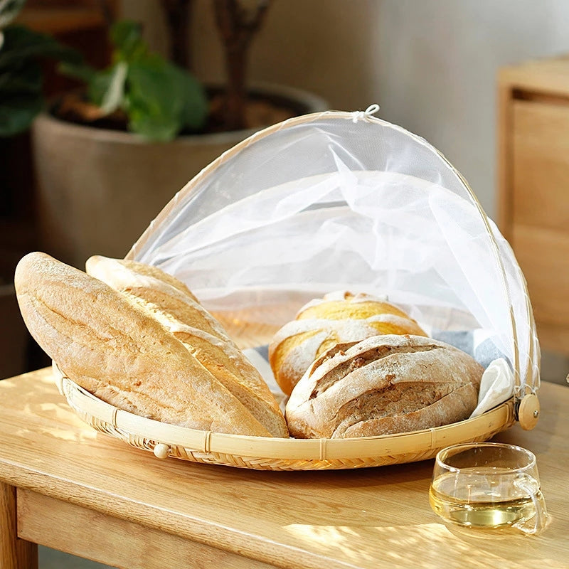 Handmade bamboo basket by Cavira, natural woven bread, fruit, and serving tray for kitchen, dining table, and home decor.