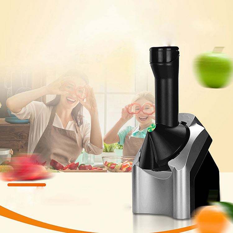 Cavira electric fruit ice cream maker in silver, showing the compact machine with fruit ingredients and frozen sorbet in a bowl