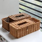 Dark and light plastic rattan-style tissue and remote control storage box, multifunctional for living and dining rooms.