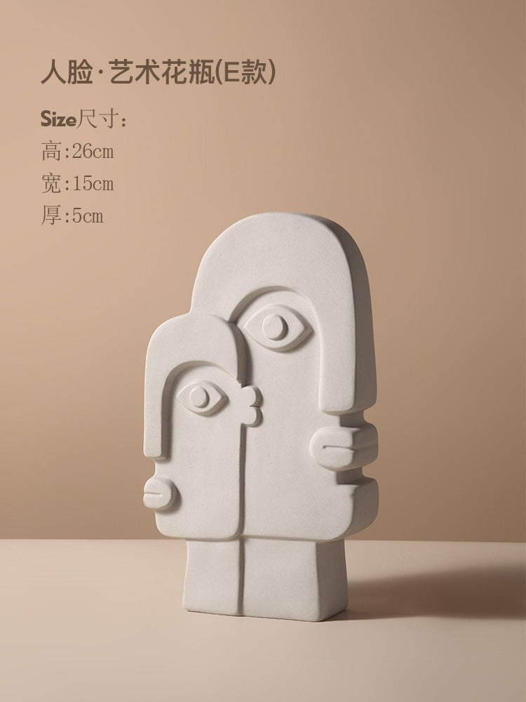 Ceramic vase with geometric abstract face design by Cavira, ideal for home decor, shelf styling, or gifting.