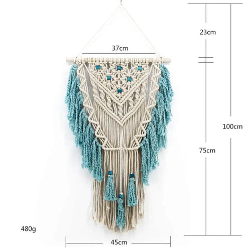 Blue bohemian hand-knotted macramé wall tapestry with cotton tassels and wooden stick for home or wedding decor.