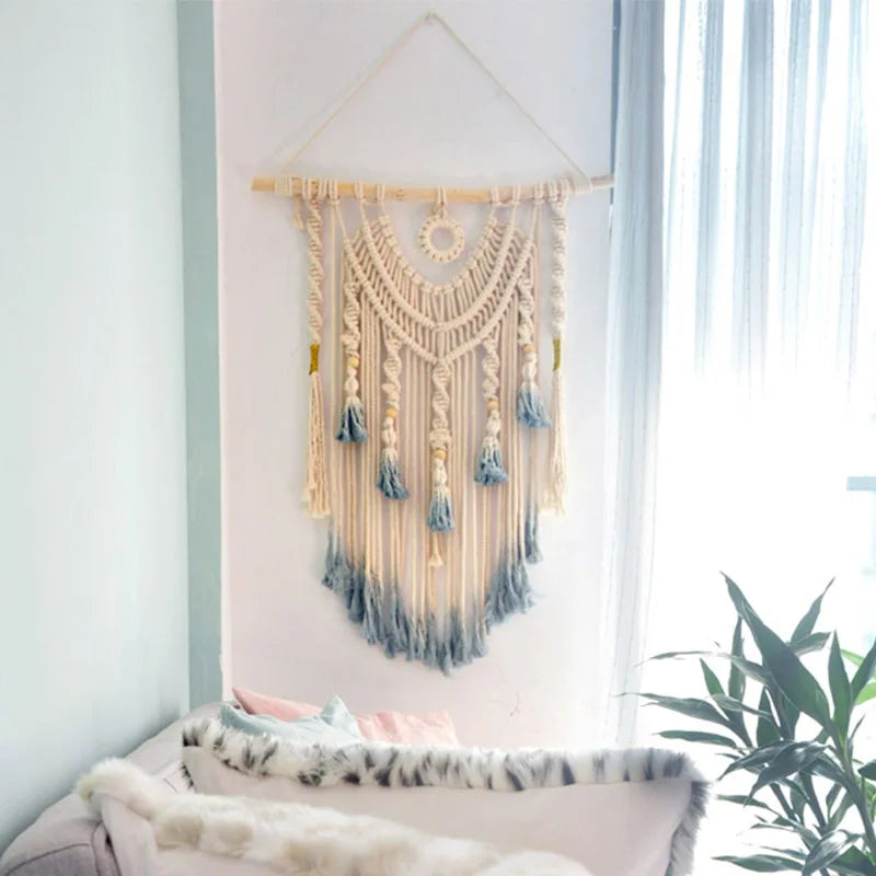 Large handmade Cavira macramé dream catcher wall hanging with woven details, perfect for bedroom decor above bed or neutral wall display