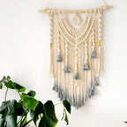 Large handmade macramé dream catcher wall hanging by Cavira, featuring boho woven tapestry for bedroom or neutral wall decor.